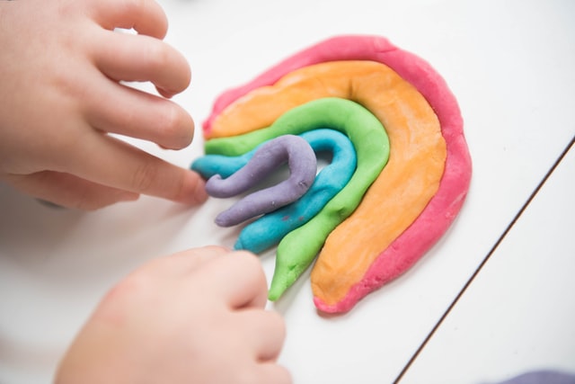 playing with rainbow playdoh