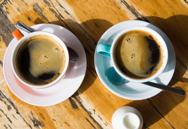 two cups of black coffee.