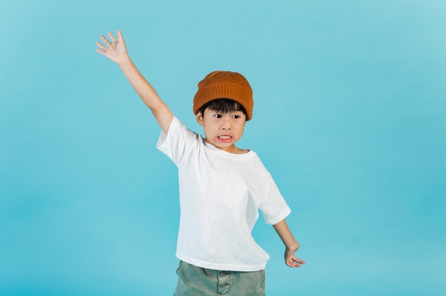 a boy with casual style in white t-shirt